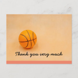 Basketboll tack med basket på orange vykort