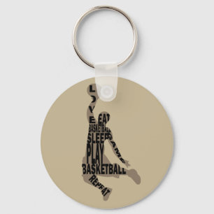 Basketbollspelare slam dunk med text i fullt nyckelring