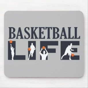 Basketbollspelare som borrar med orange boll musmatta