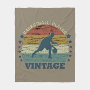 Basketbollspelare som kör vintagens återstart fleecefilt