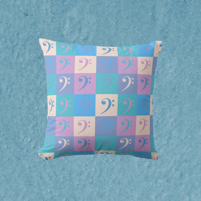 Bass Clef Music Pastel Colors Pattern Kudde (A throw pillow with a pattern of bass clefs in a pastel color scheme.)