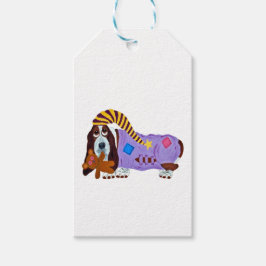 Basset Hound i pyjamas med nallebjörn Presentetikett