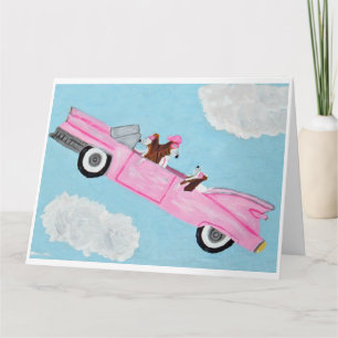 Basset Hound i rosa cabriolet på himlen Kort