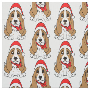 Bassethund i den Santa hatten på jul Tyg