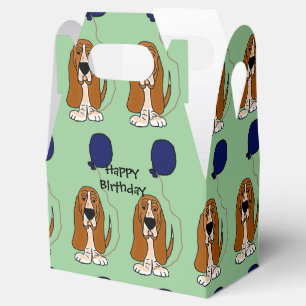 Bassethunden med ballongfödelsedaggåvan boxas presentaskar