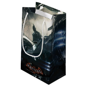 Batman med batteri i regnet