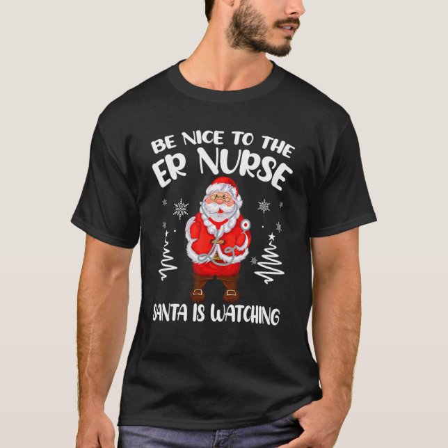 Be Nice To The ER Nurse Santa Is Watching Nursing  T Shirt (Framsida)