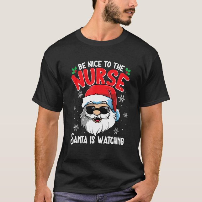 Be Nice To The Nurse Santa Is Watching  Christmas  T Shirt (Framsida)