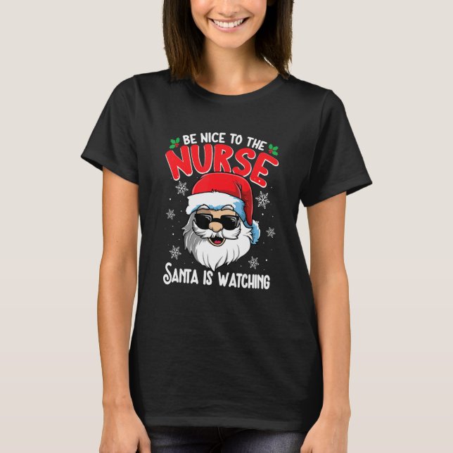 Be Nice To The Nurse Santa Is Watching  Christmas  T Shirt (Framsida)
