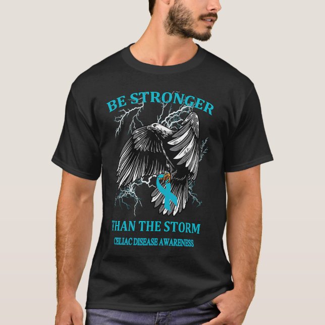 Be Stronger Than The Storm Celiac Disease T Shirt (Framsida)