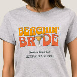 Beach Bachelorette Party Retro Beachin Bride T Shirt<br><div class="desc">Gör en stänk på din kommande bachelorette-fest med den här bedövande stranden personlig t-shirts. Vare sig du firar en bach resa, en flicksemester eller en helgdag av bästa vänner, är den här anpassningsbar stranden på t-shirts som är perfekten som tillägg till din oförglömliga flykting. Lägg till en personlig beröring till...</div>