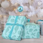 Beach jul Seahorse Mönster Aqua Glitter Presentpapper<br><div class="desc">Denna vackra akvblåa julinsvepande pappra havsbotten är mönster i glitter,  sjöar,  sjöar och hakar för att skapa en helgdag för en flodstrand.</div>