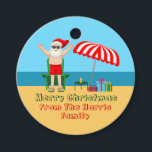 Beach Jultomten Anpassningsbar Sunny jul Party Gåvor Etiketter<br><div class="desc">Den här söta julen i juli-festen ger märkre till perfekt sommaren party-dekorera för en strandbänk eller bassäng-samling. Gör det till en roligt nordpolare, så att extravaganza med Jultomten i hans simbassänger bredvid ett rödvitt strandparaply och -gåvor. Jag har aldrig sett mr Klaus i en badande kostym förut! Grönten binder samman...</div>