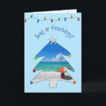 Beach Photo Seas och Hälsning Julgran Helgkort<br><div class="desc">Önska Säsonhälsningarna från stranden den här julhelgen med det här söta jullkortet för foto med hälsning, "Seas & Hälsning" i ett bågstift med en vit sandstrand, ett färglöst strandparaply och sjölandskap inuti ett vismiskt Julgran med en stjärnfisk högst upp! Inuti kortet finns ditt foto och meddelandet "Varmaste julhälsningar från stranden",...</div>
