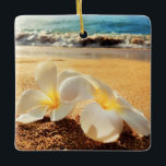 Beach Plumeria Christmas Ornament<br><div class="desc">Bring a lot more holiday cheer to your tree with our custom ceramic ornament. Add family photos, images and personal message to both sides of this ornament. A strand of gold thread makes it easy to hang this fantastic keepsake. Dimensions: 2.75"l x 2.75"w; Weight: 0.96 oz. Made of white porcelain...</div>