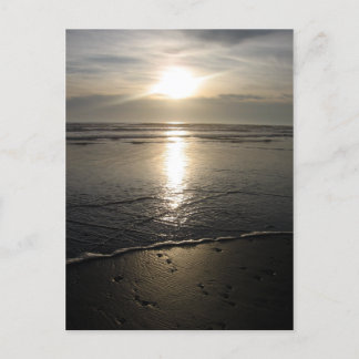 Beach sten och en solnedgång vykort