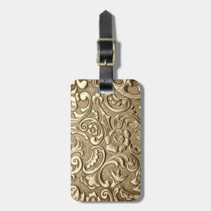 Bearbetat guld bagagebricka