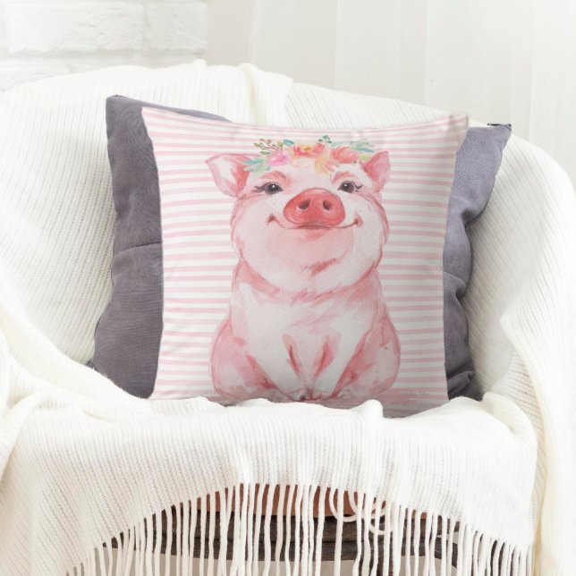 Bedårande akvarellgris kudde (A throw pillow decorated with an adorable watercolor pig.)
