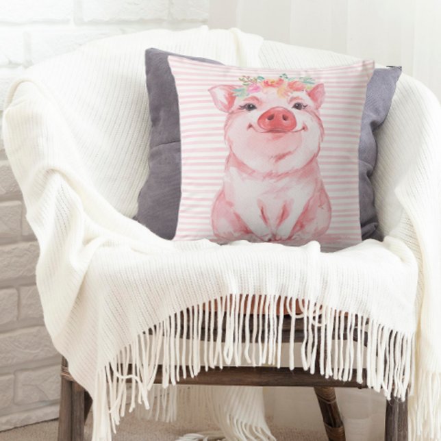 Bedårande akvarellgris kudde (A throw pillow decorated with an adorable watercolor pig.)