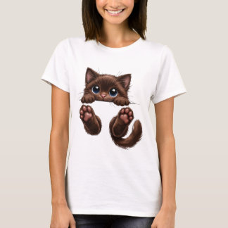 Bedårande brun kattunge med blå ögon tittar fram t shirt