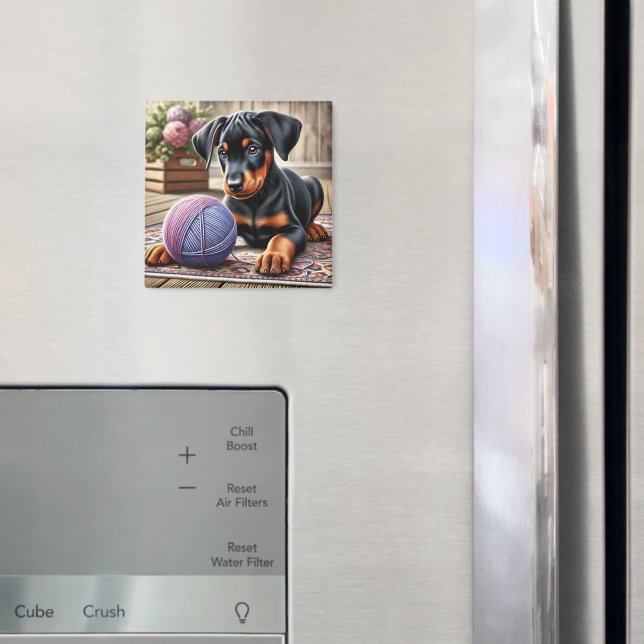 Bedårande svart och tan-valp med garnboll  magnet (In Situ (Fridge))