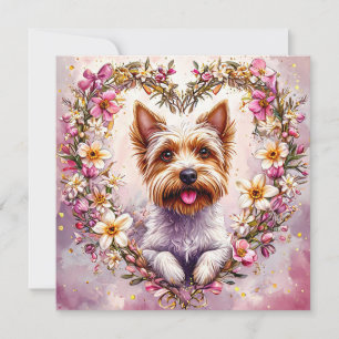 Bedårande Yorkie omgiven av blomsterkrans