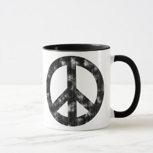 Bedrövad fredsteckensvart mugg
