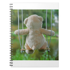 Beer op schommel vanaf de rug. anteckningsbok