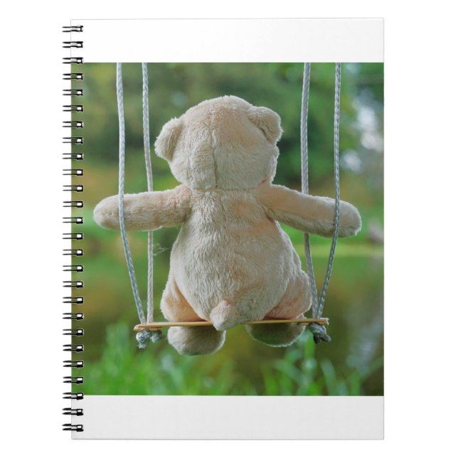 Beer op schommel vanaf de rug. anteckningsbok (Framsidan)