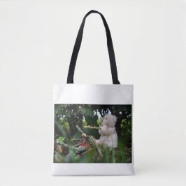 Beertje dat bij kampvuur zit. tygkasse