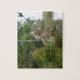 Beertje op schommel aan boom pussel