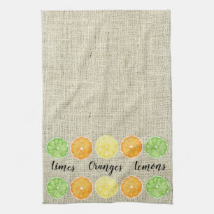Begränsa Orangar och citroner på Linens bakgrund Kökshandduk