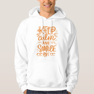 Behållalugn och leende på hoodie