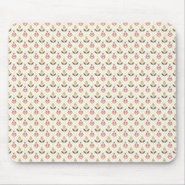 Beige musmattor med ett upprepat blommigt mönster