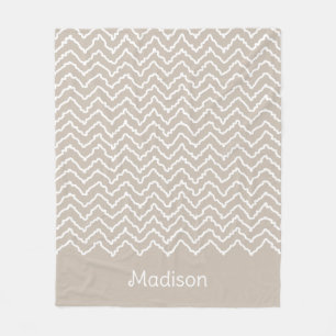 Beige och vit snurrig chevron sicksack-mönster fleecefilt