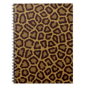 Belägga med tegel bakgrund med en leopardpäls anteckningsbok med spiral