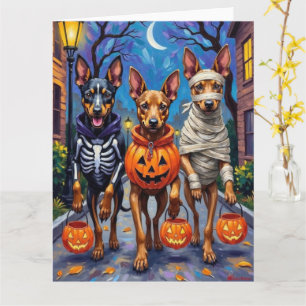 Belgiska Malinois-hundar som går runt på halloween Kort