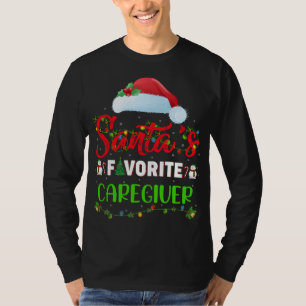 Belysning av Julafton Santa's Favorite Caregiver j T Shirt