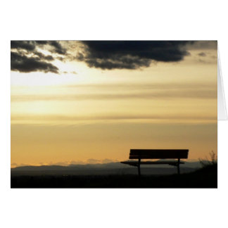 Bench vid solnedgång hälsningskort