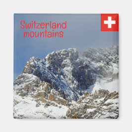 Berg i Schweiz täckta av snö Magnet
