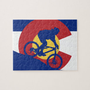 Berg som cyklar den Colorado flagga Pussel
