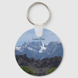 Bergsområden med tak över snö i Lone Gräs Nyckelring