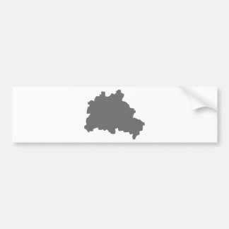 Berlin drar upp konturernaa av symbolen bildekal