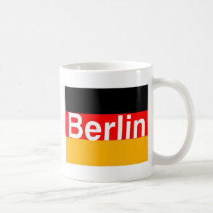 Berlin logotyp i vit på tysk flagga kaffemugg