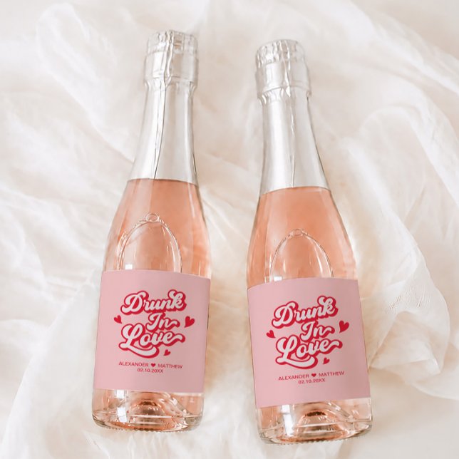 Berusad i kärlek röd och rosa bröllopschampagne gå (Skapare uppladdad)