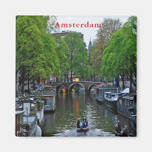 Beskåda av en av de Amsterdam canals.na Magnet