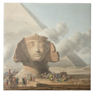 Beskåda av huvudet av sphinxen och pyramiden av kakelplatta