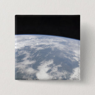 Beskåda av planetjord från utrymme knapp