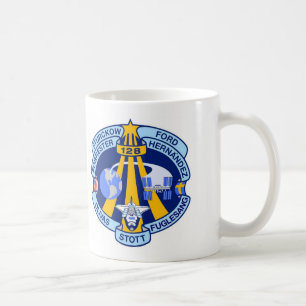 Beskickningen STS-128 lappar Kaffemugg