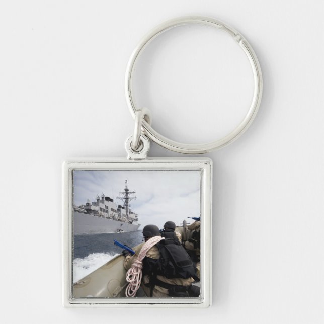 Besöksmedlemmar, styrelse, sökning fyrkantig silverfärgad nyckelring (Framsidan)